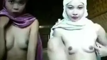 Dua ABG Berjilbab Pamer Memek Dan Toket poster